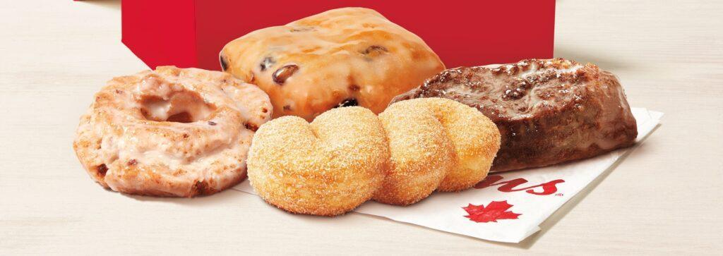 Tim Hortons Brings Back Retro Donuts With Two New Flavours 4 Tim Hortons Brings Back Walnut Crunch, Dutchie, Introduces Blueberry Sour Cream and Sugar Twist Retro Donuts June 2024